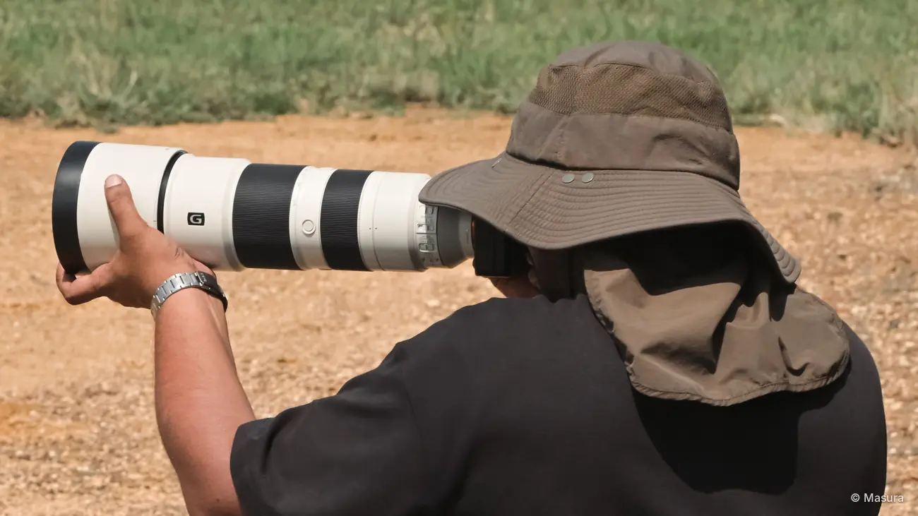 Pramukh Bajaj shooting with a long lens at close range